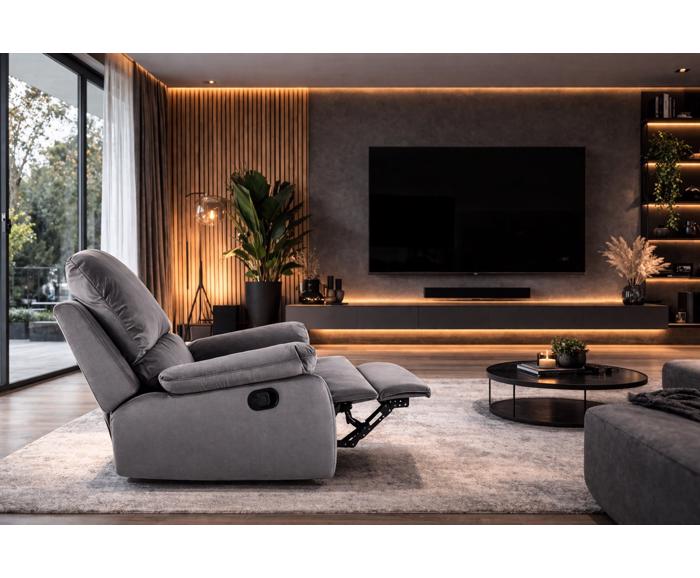 Šedé polohovací sametové křeslo Spencer 1 v moderním interiéru